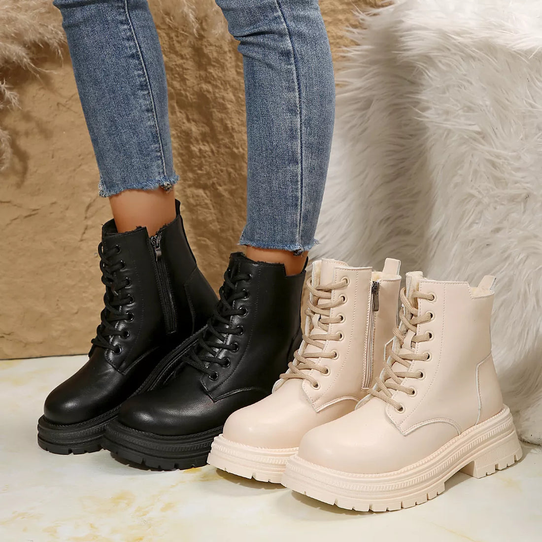 Black and off-white lace-up platform round-toe boots with side zips