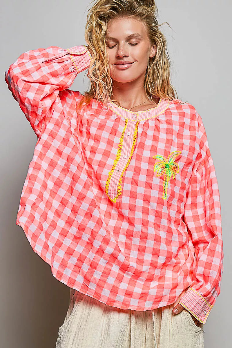 Pink gingham embroidered blouse with puff sleeves and palm tree embroidery