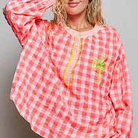 Pink gingham embroidered blouse with puff sleeves and palm tree embroidery