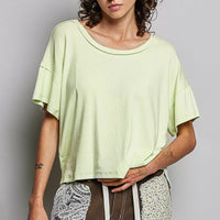 Mint green round-neck short-sleeve T-shirt with high-low hem, relaxed drape
