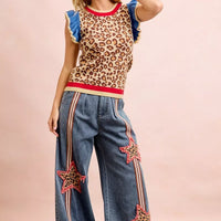 Leopard print knit tank top, blue ruffled sleeves, red collar and hem band