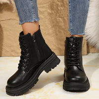 Black lace-up platform round-toe boots with side zip and layered tread sole