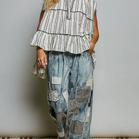 Grey multi-striped sleeveless cotton top with tiered ruffle hem and short button placket