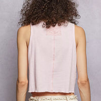 Pink ribbed cropped tank with round neck, back view