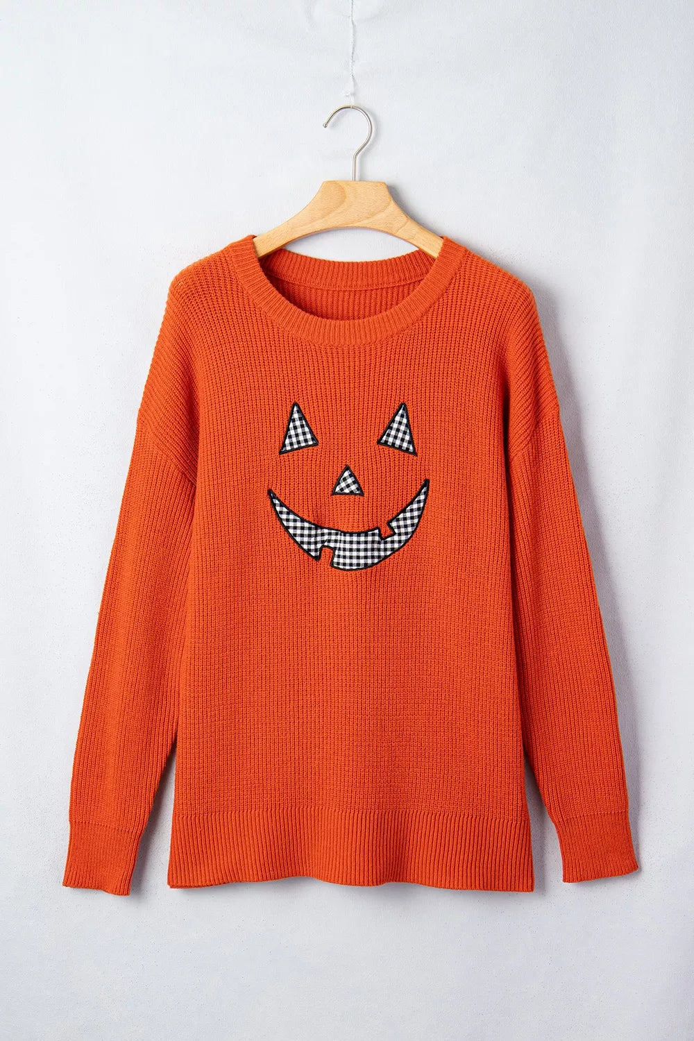 Orange knit sweater with jack-o&