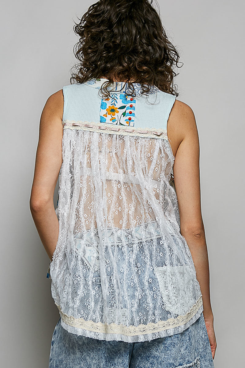 Light blue sheer V-neck lace-trim tank, floral back yoke detail.