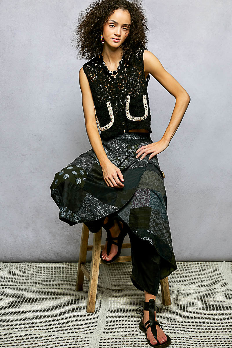 Black crochet cropped vest with button front and horseshoe applique