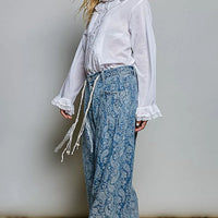 Ivory button-down shirt with lace cuff ruffles and pintuck front placket
