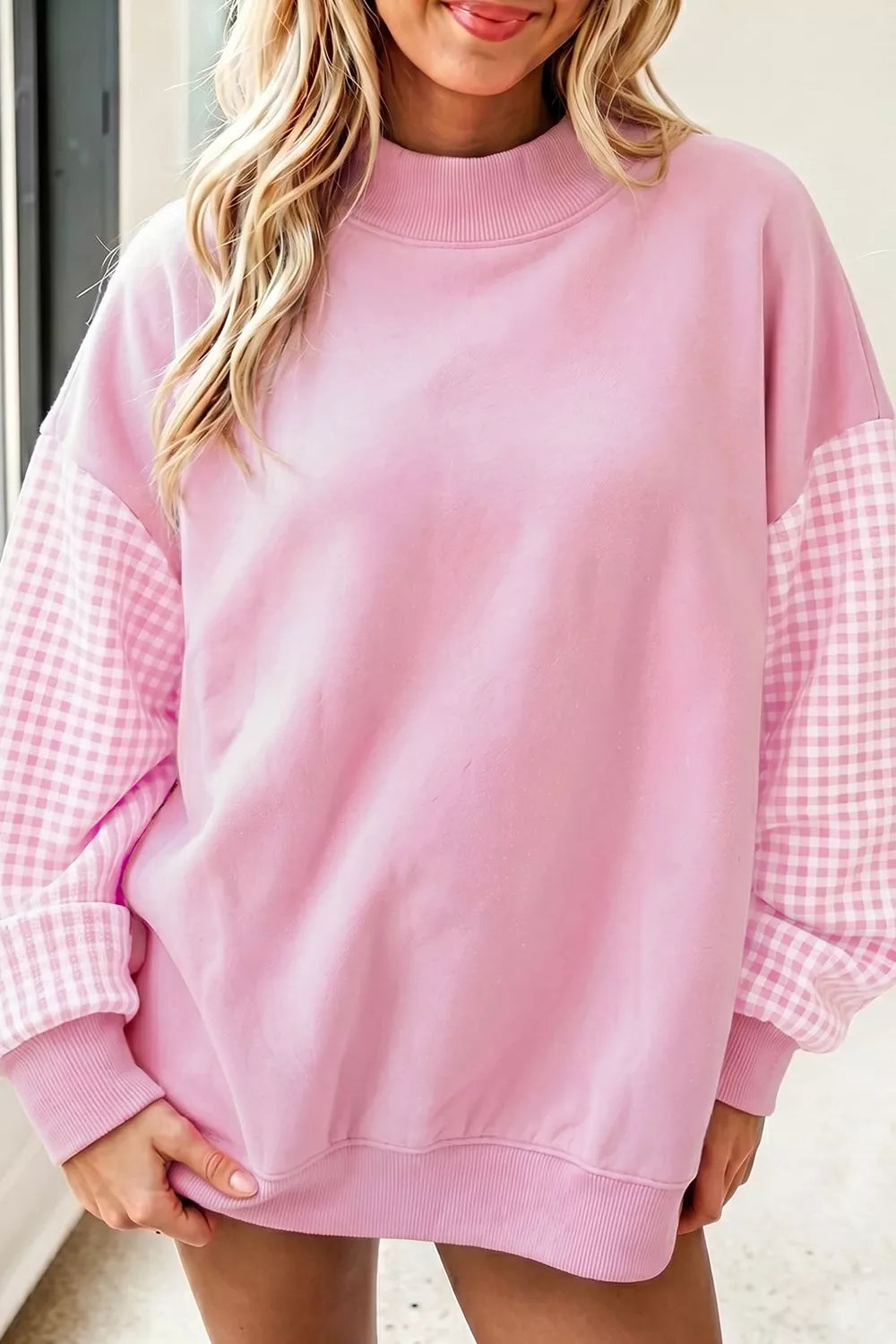 Blush pink loose tunic sweatshirt with plaid check contrast sleeves