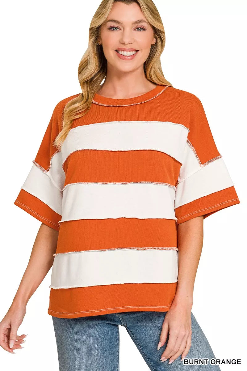 Burnt orange and white striped terry top with crew neck and contrast trim