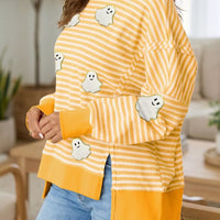 Yellow and white striped long-sleeve top with ghost patches and yellow hem