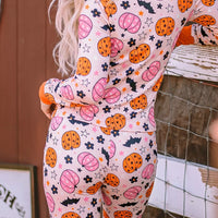 Dusty pink pumpkin-print long-sleeve pajama set with orange-trim button placket