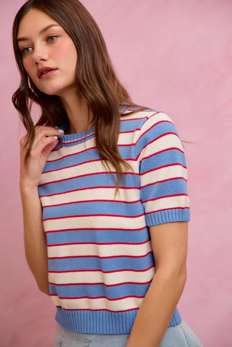 Striped knit crew neck short-sleeve sweater top in blue, red, and white; ribbed collar