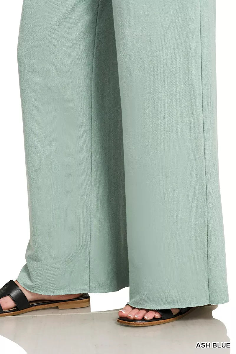 Ash blue wide-leg sweatpants with flowing hem drape; elastic waistband detail