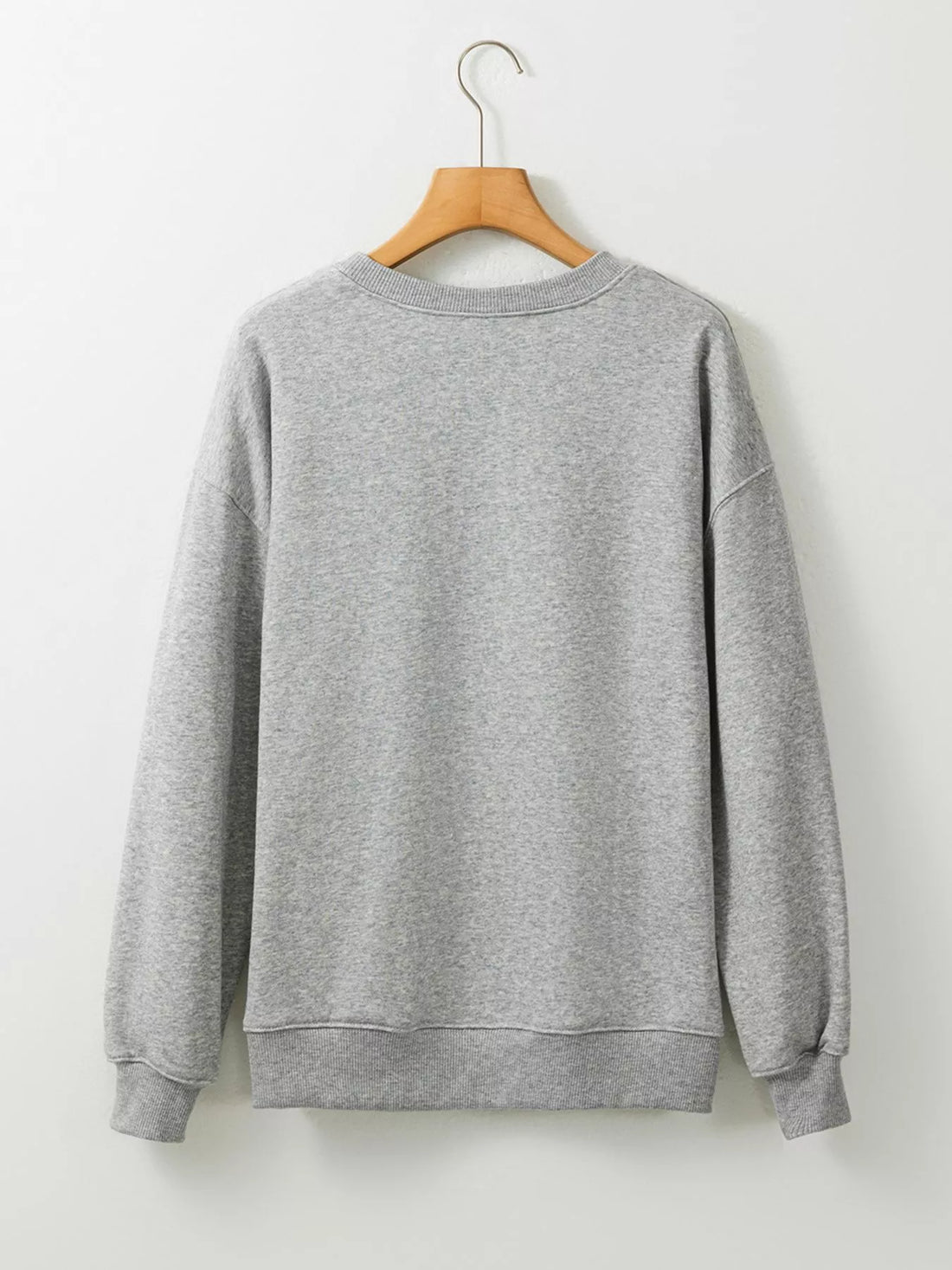 Gray sweatshirt on hanger, plain back with long sleeves and round neckline