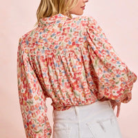 Floral print crop shirt back view with gathered tiers and tied hem