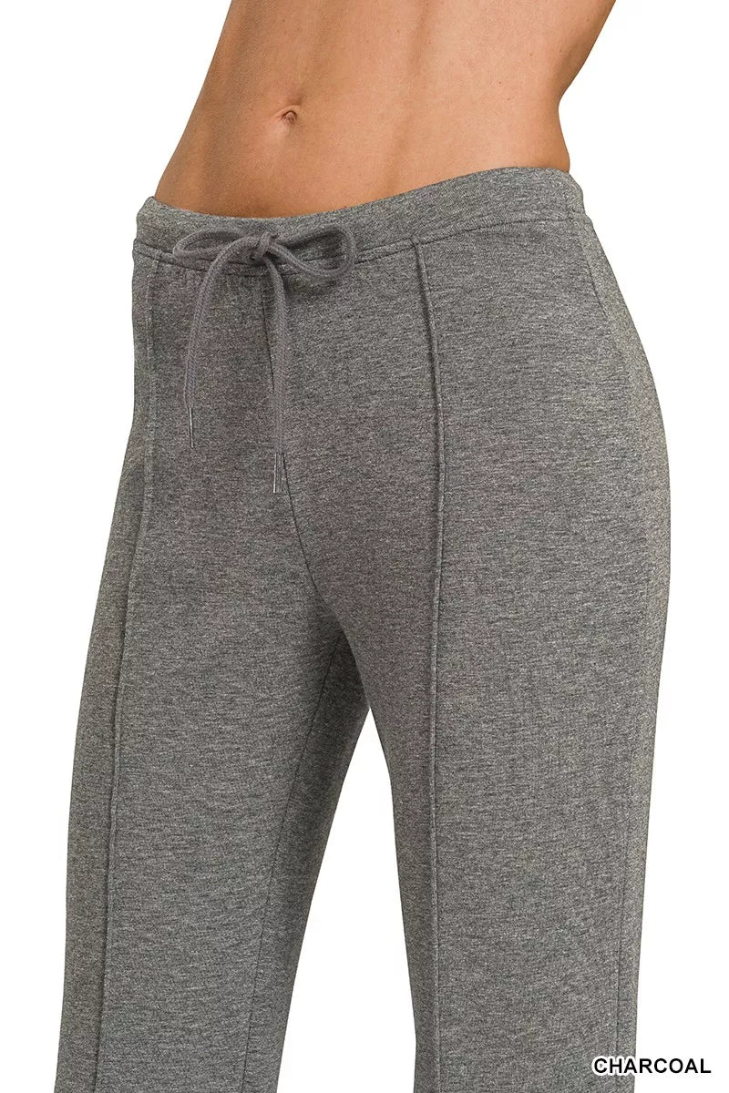 Charcoal drawstring waist pants with relaxed fit and wide straight hems