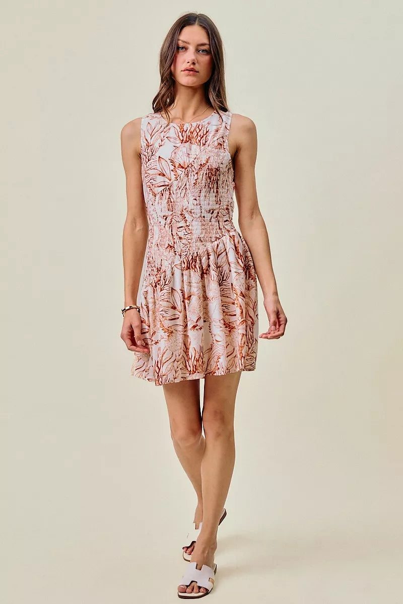 Taupe shell print smocked sleeveless mini dress with fit-and-flare skirt