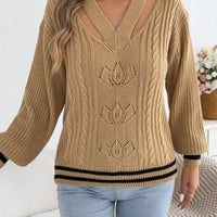 Camel V-neck cutout cable knit sweater with knit floral motifs and striped hem