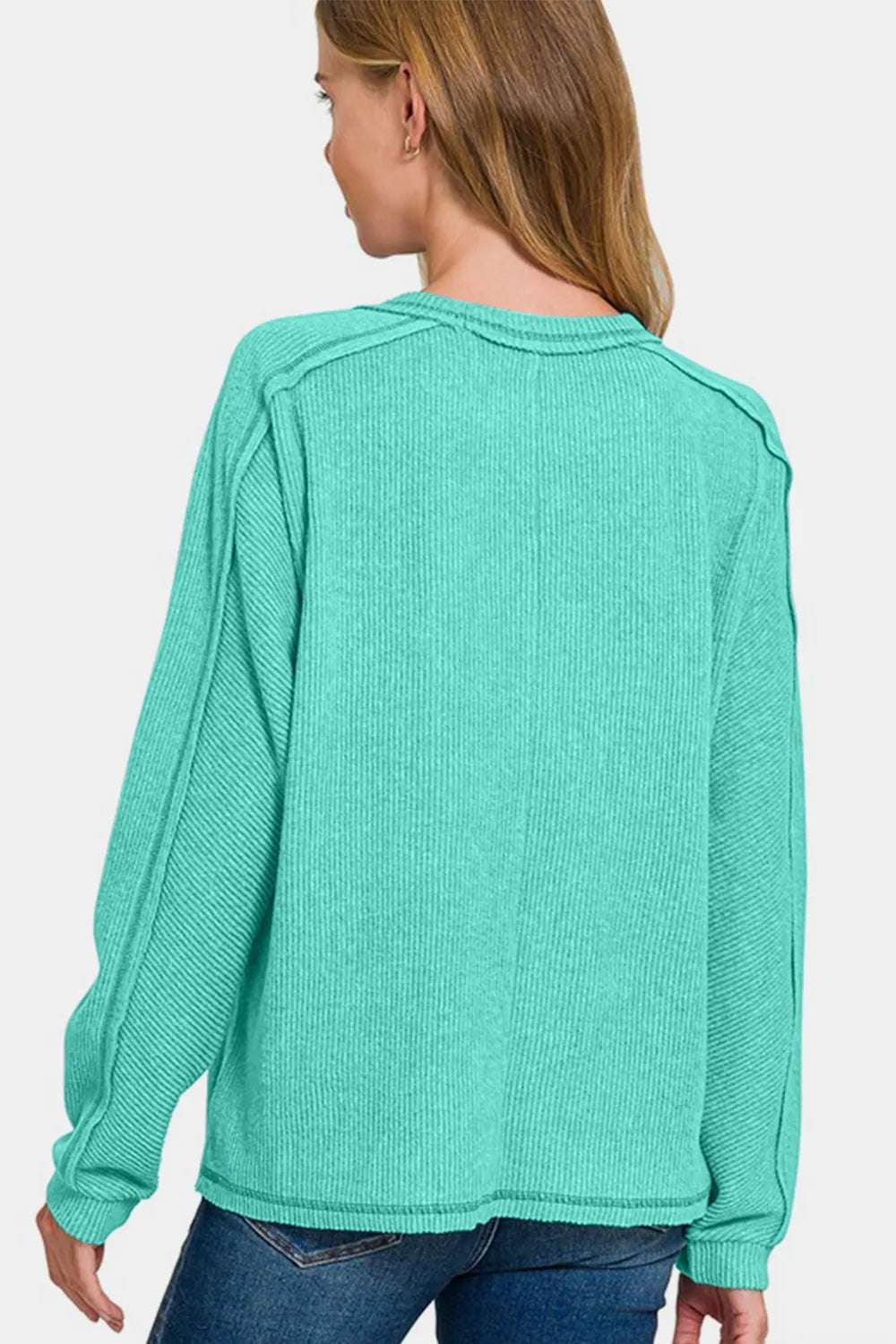Turquoise brushed ribbed knit top with crew neck and long sleeves, back view