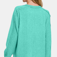 Turquoise brushed ribbed knit top with crew neck and long sleeves, back view