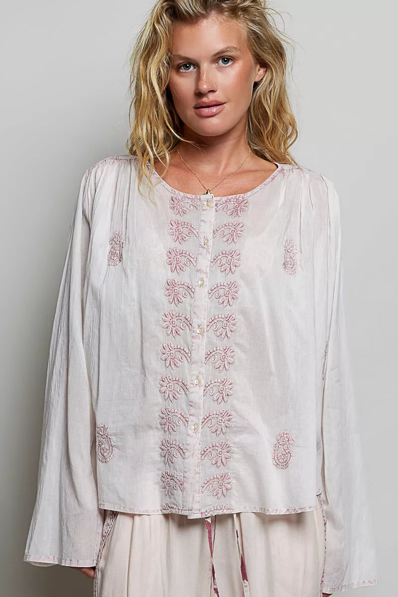 Embroidered gathered-shoulder long-sleeve shirt in off-white with blush floral placket