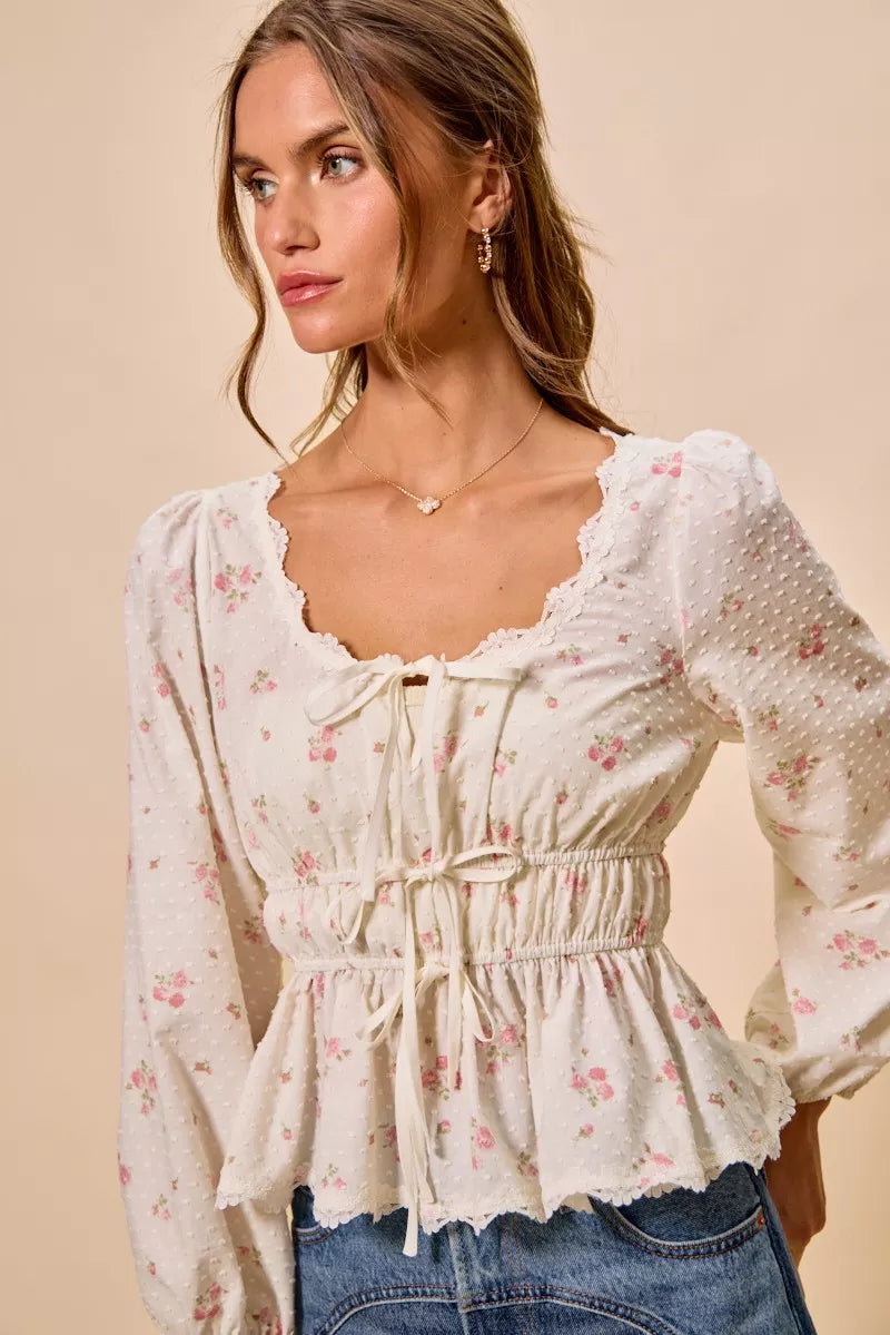 White floral clip-dot blouse with scalloped lace neckline, ruched center, and gathered waist
