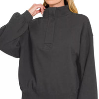 Black fleece half-snap sweatshirt with half-button placket and tall collar