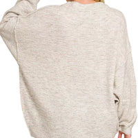 Oversized bone melange sweater back view with round neck and exposed side seams