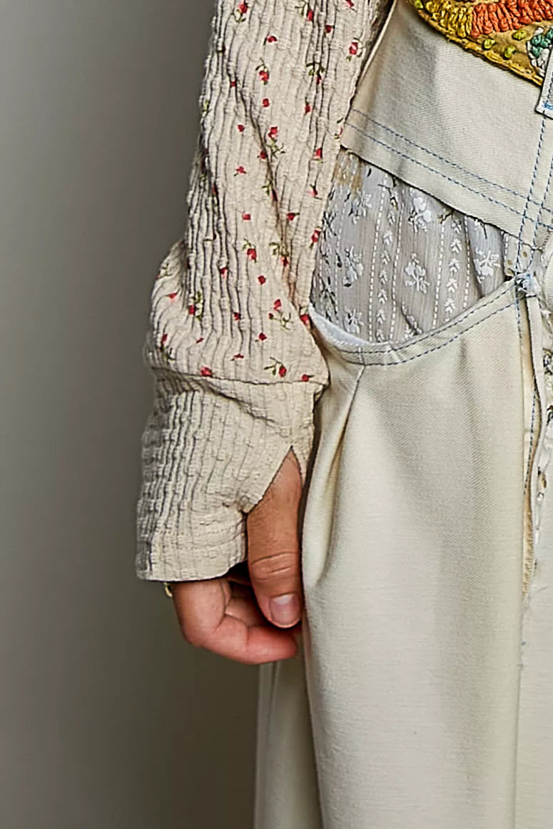 Long-sleeve knit top with ribbed cuff and mini floral print at side hem