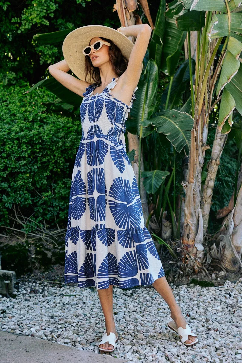 Smocked bodice tiered midi dress with navy abstract print, sleeveless, below-knee