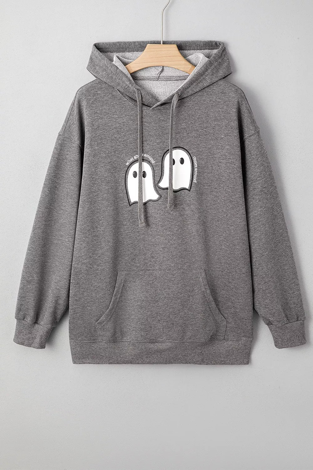 Dark gray oversize pullover hoodie with ghost face graphic on chest, drawstring hood