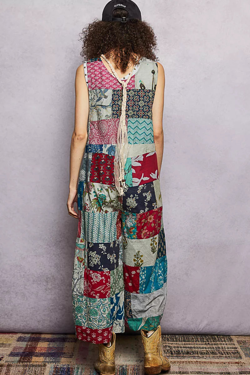 Back view sleeveless patchwork wide-leg jumpsuit in multicolor patch blocks