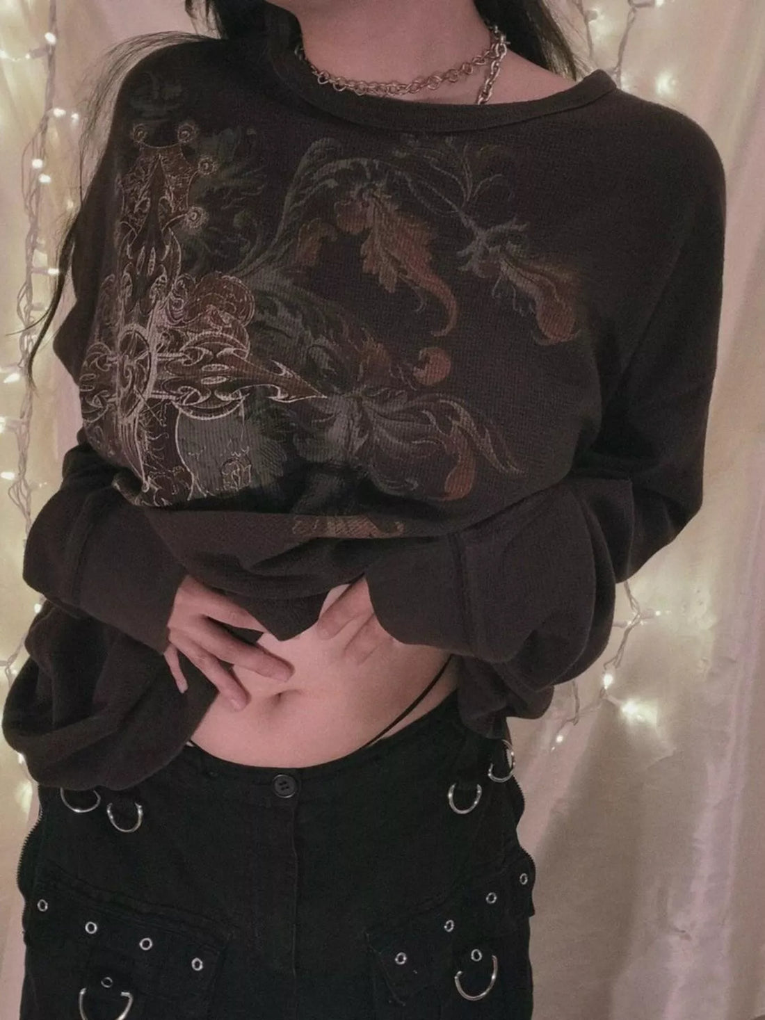 Black long sleeve t-shirt with large ornate skull graphic on front
