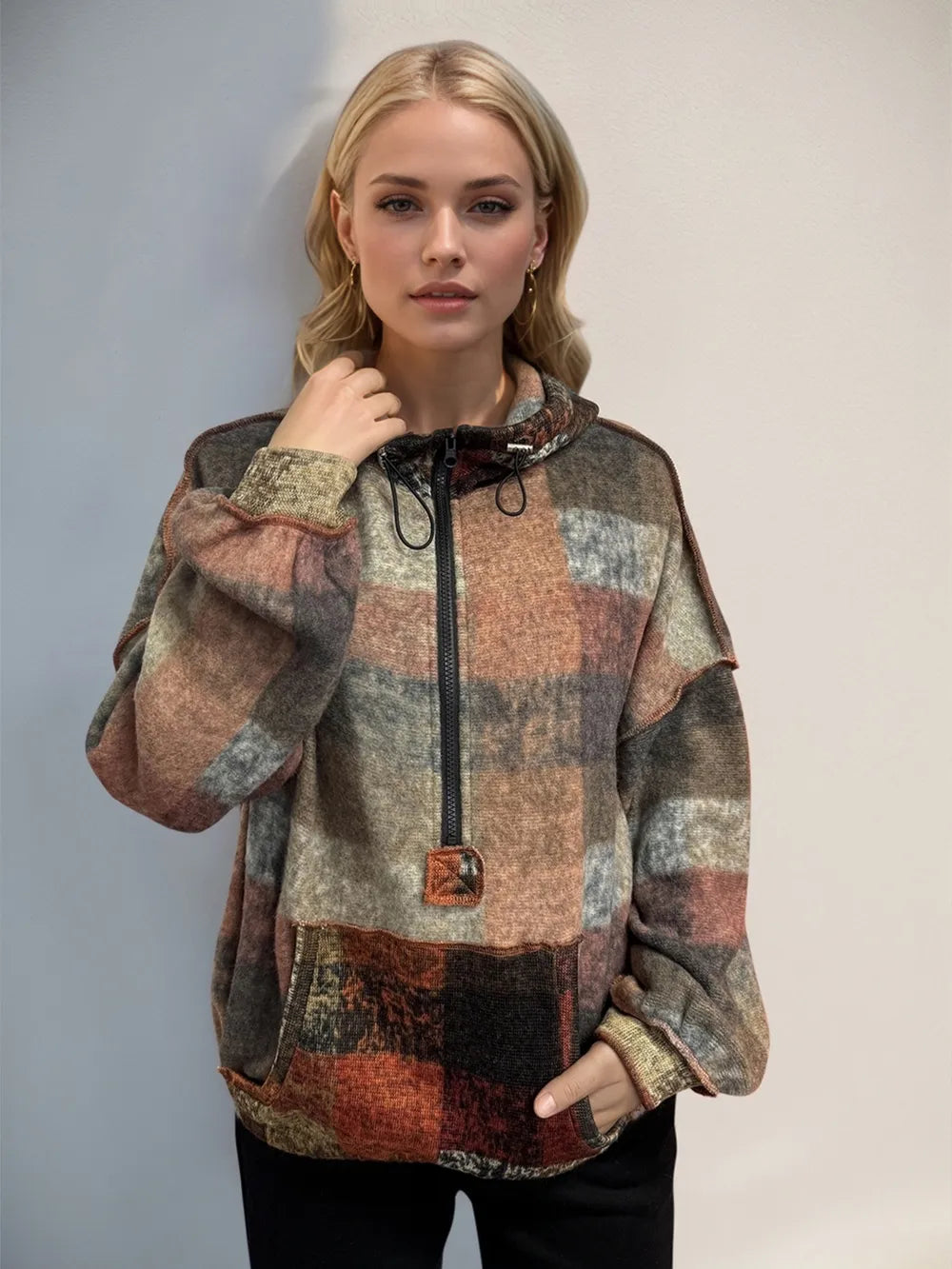 Multicolored plaid half-zip fleece hoodie with hood and kangaroo pocket, zip front