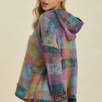 Multicolor plaid fleece hoodie with hood and quarter-zip placket, side view