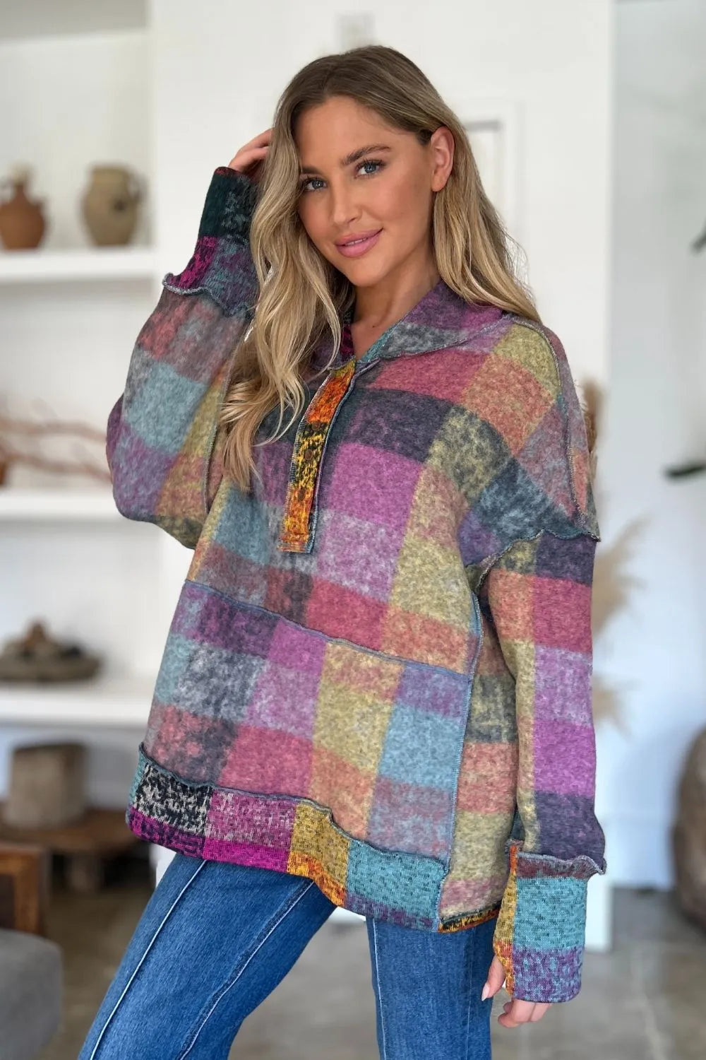 Multicolor plaid fleece hoodie with hood and quarter-zip placket, relaxed dropped shoulders