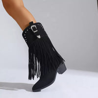 Black fringe round-toe block-heel boots, side view with studded strap and buckle