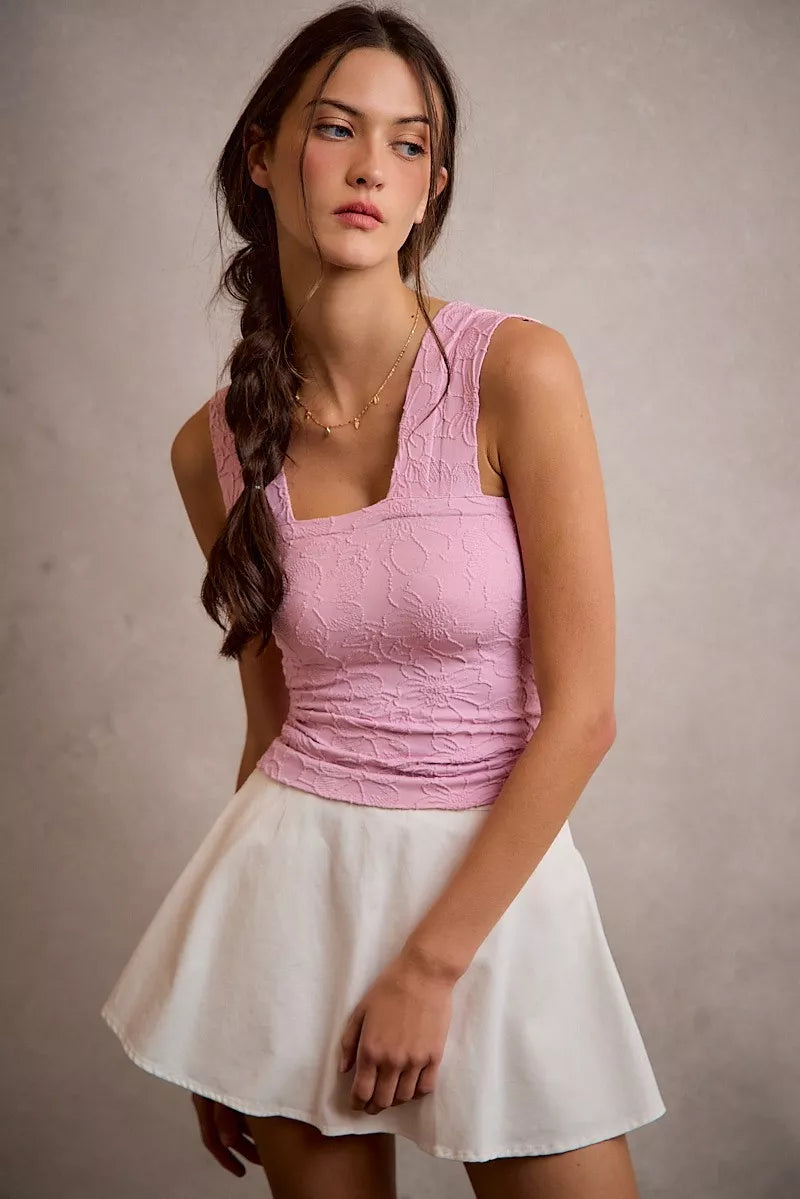 White denim bubble skort with smocked waistband and flared mini skirt hem