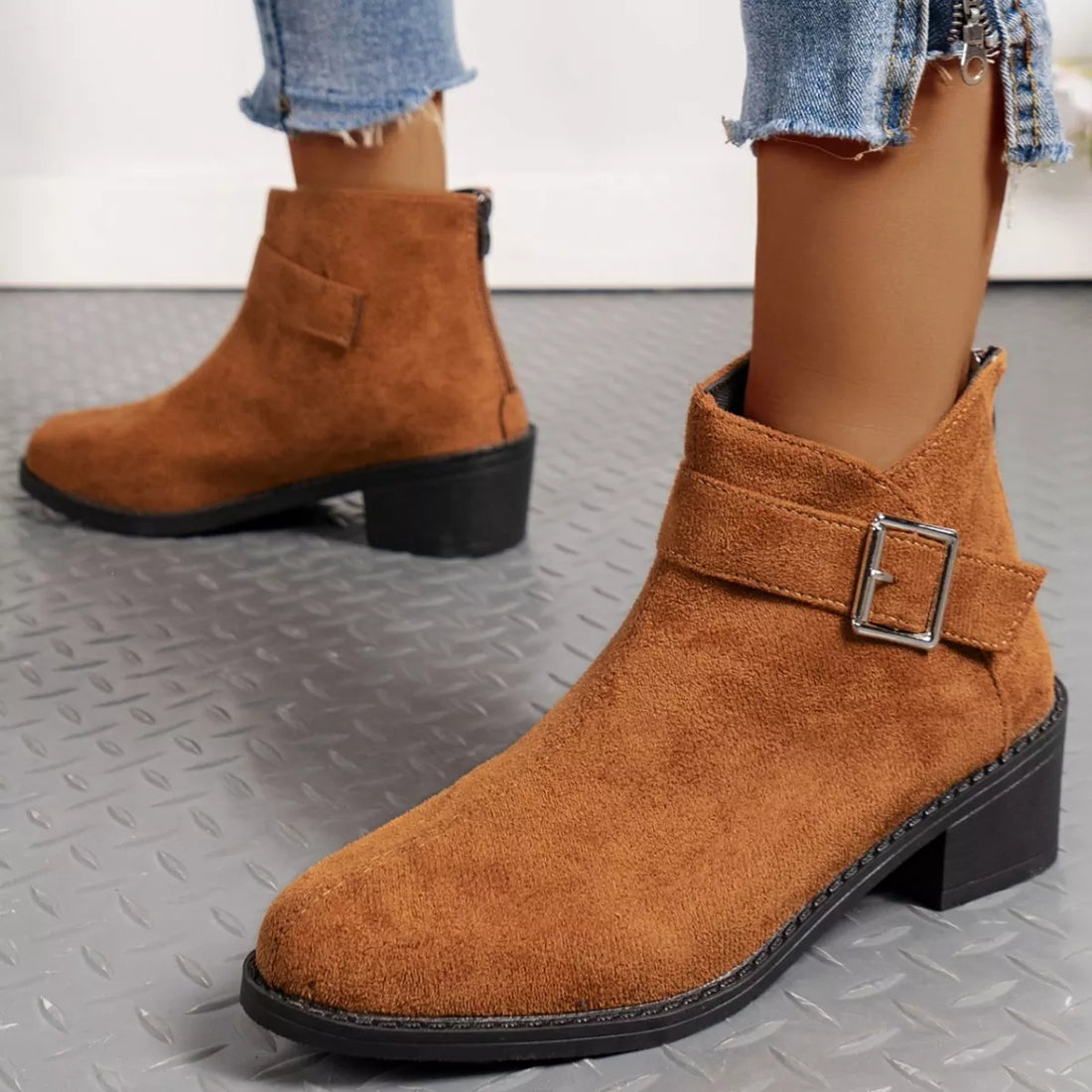 Brown suede point-toe block heel ankle boots with front strap and square buckle