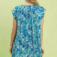 Blue tropical floral swing dress back view with flutter sleeves