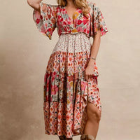 Floral print tiered midi dress with V-neck, short flutter sleeves, and ruffle waist