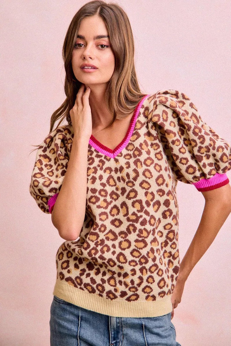 Leopard print puff-sleeve V-neck sweater with hot pink trim, side view