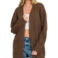 Open-front knit cardigan in chocolate brown with long sleeves and front pockets
