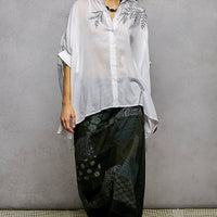 Ivory embroidered floral button-front shirt with draped silhouette and high-low hem