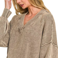 Brown washed deep V-neck sweater with dropped shoulders and ribbed knit trim