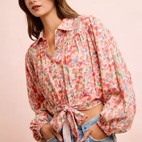 Floral print crop shirt with button front, standing collar, and tied hem