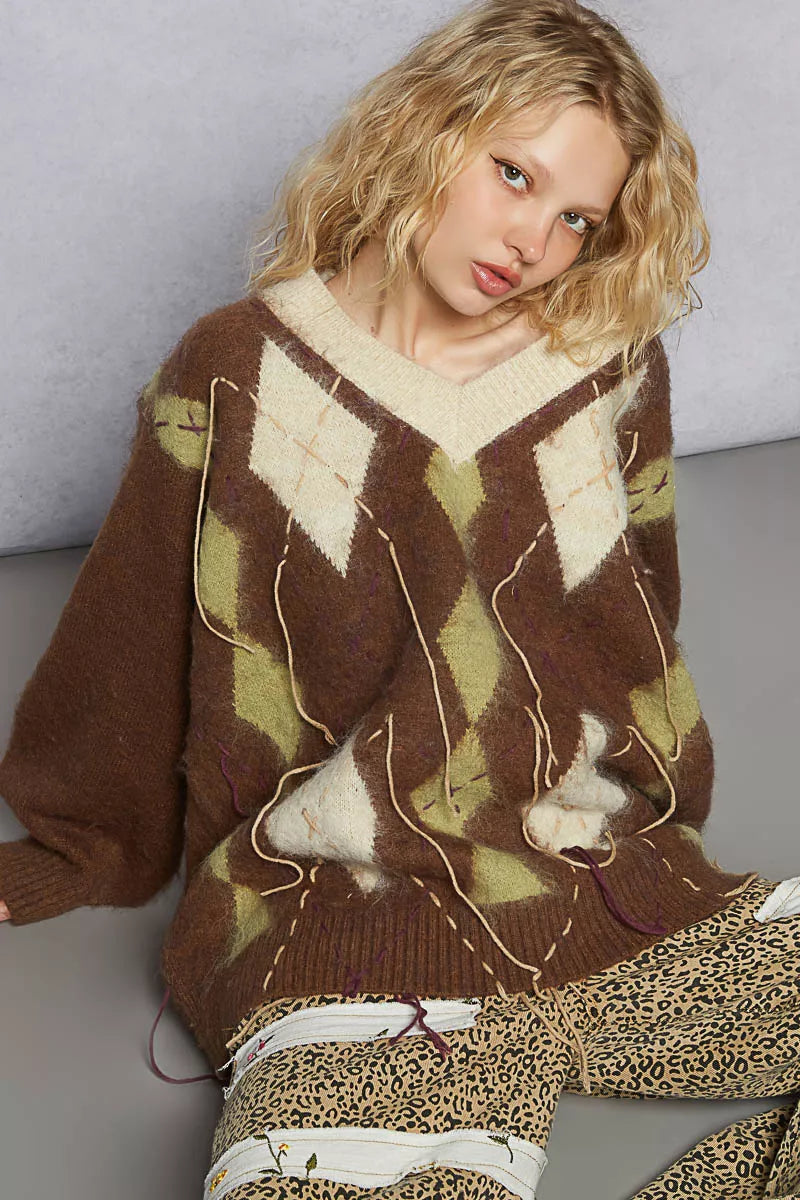 Mocha V-neck argyle mohair sweater with long sleeves, white/green diamonds, and contrast stitching