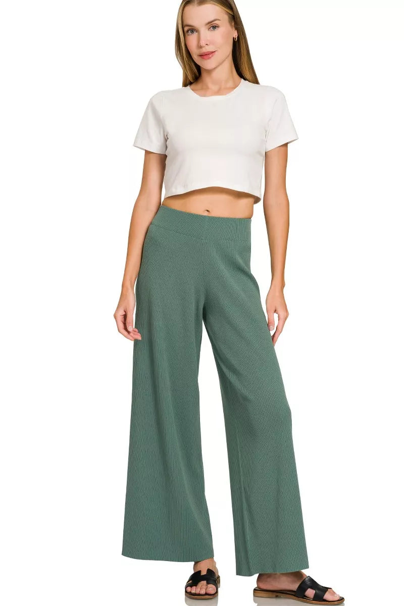 Jade green wide-leg pants with matching cropped knit top