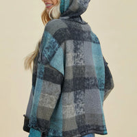 Plaid fleece hoodie with hood, half-zip, plaid blocks, back/side view.